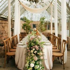YES Hire's oak cross back chairs and oval table are used as part of a photo shoot at Hutton Wandesley Stables