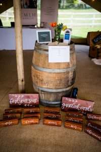 An oak wine barrel used as a posuer table at an event in Yorkshire