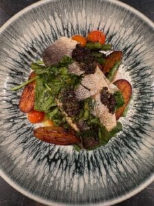 A stellar patterned bowl, with food